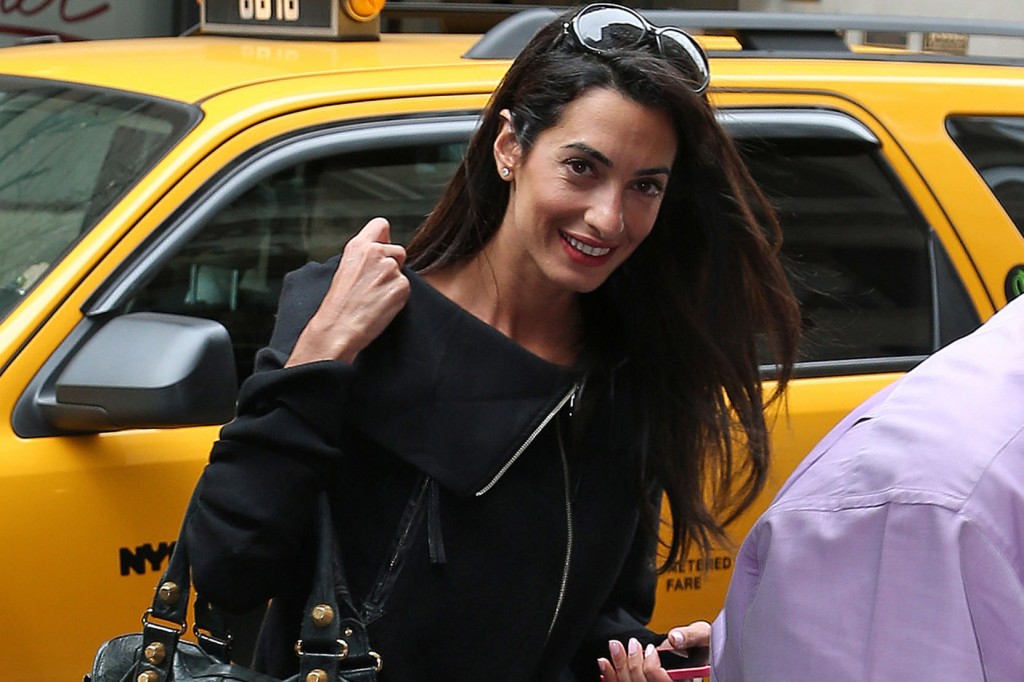 George Clooney's lawyer girlfriend Amal Alamuddin checks out of there hotel leaves separately in New York City.