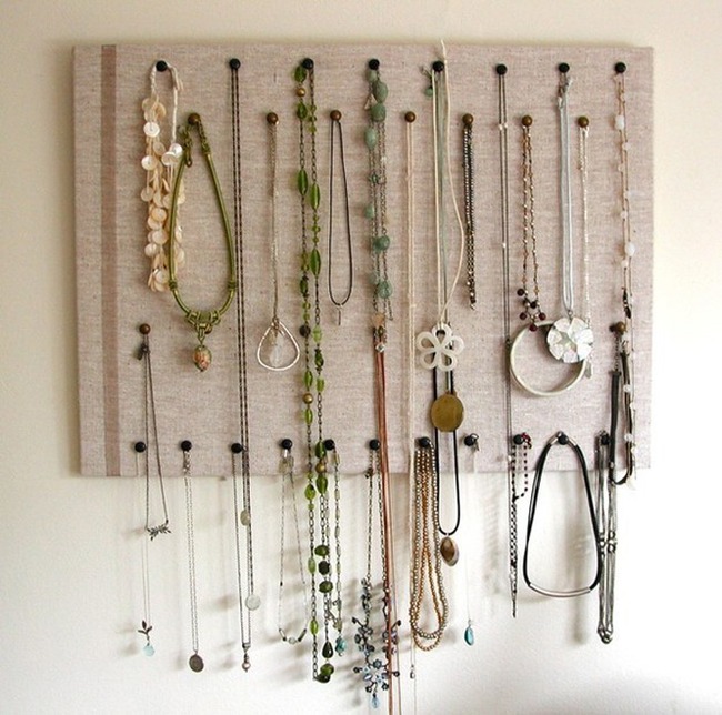 15. Push pins + cork board will organize your necklaces