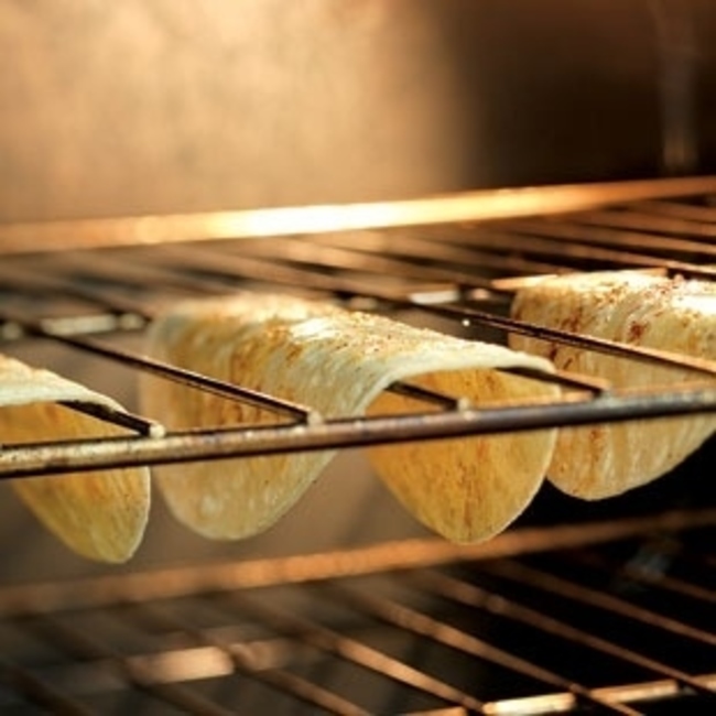 5. Make taco shells at home with just tortillas and an oven.