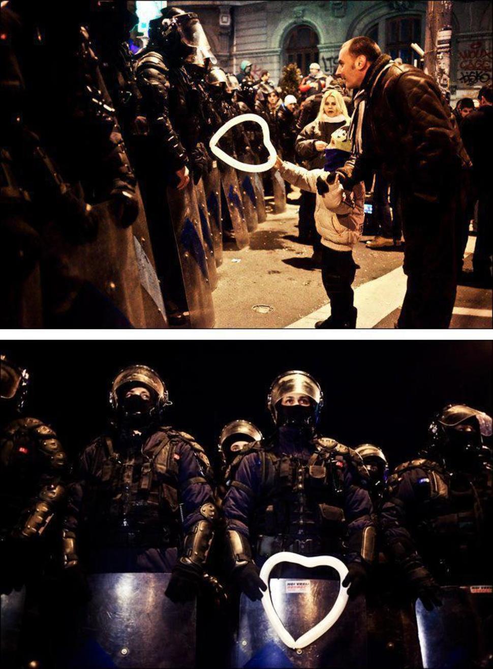 12. Touching moment from the riot in Bucharest, Romania