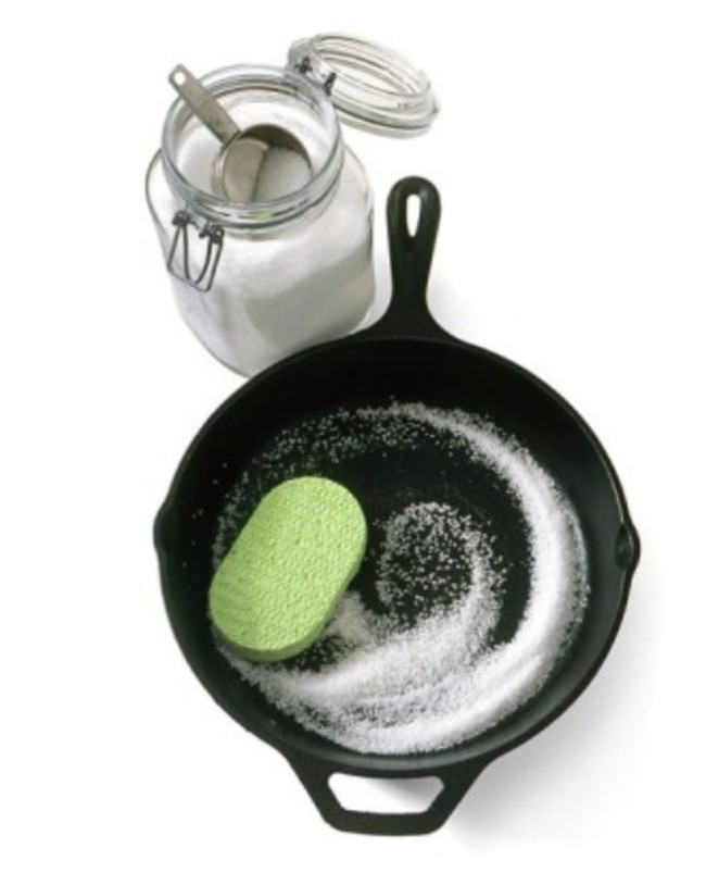 7. Remove the grise and residue from the cast aron skillet with sea salt, water and sponge