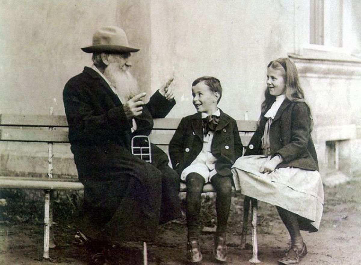 20. Leo Tolstoy tells a story to his grandchildren in 1909