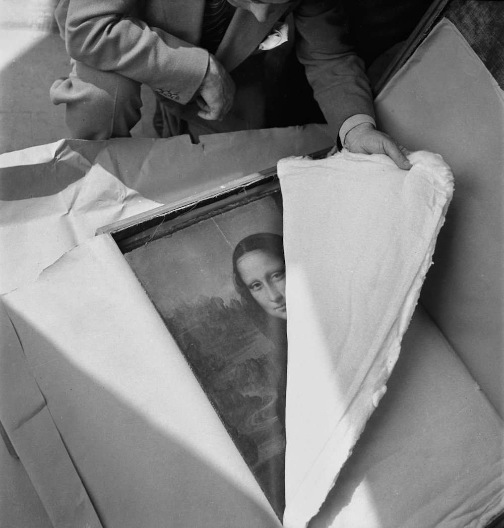 The Mona Lisa being unpacked after spending WWII in hiding, 1945