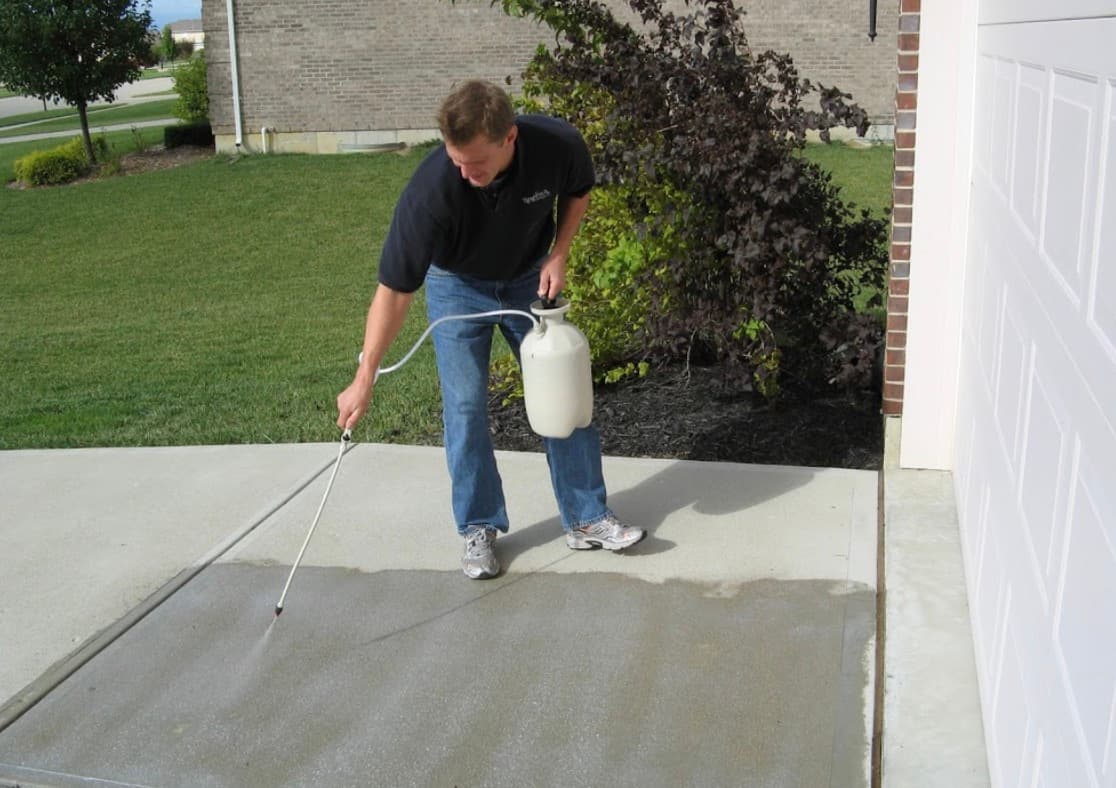 The Benefits and Process of Sealing Your Concrete Driveway