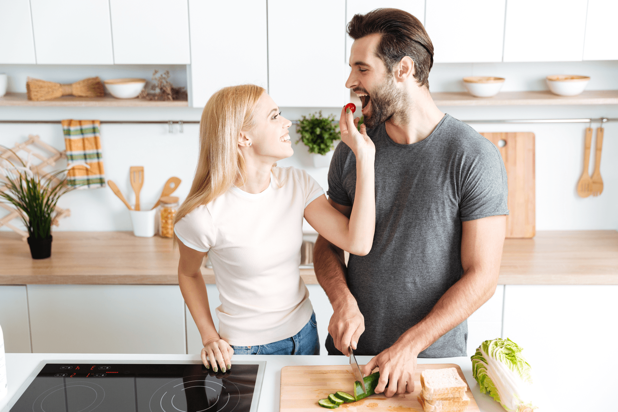 Couple cooking in modern kitchen