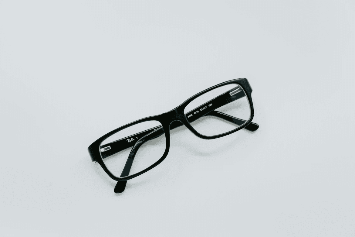 Black prescription eyeglasses on white background