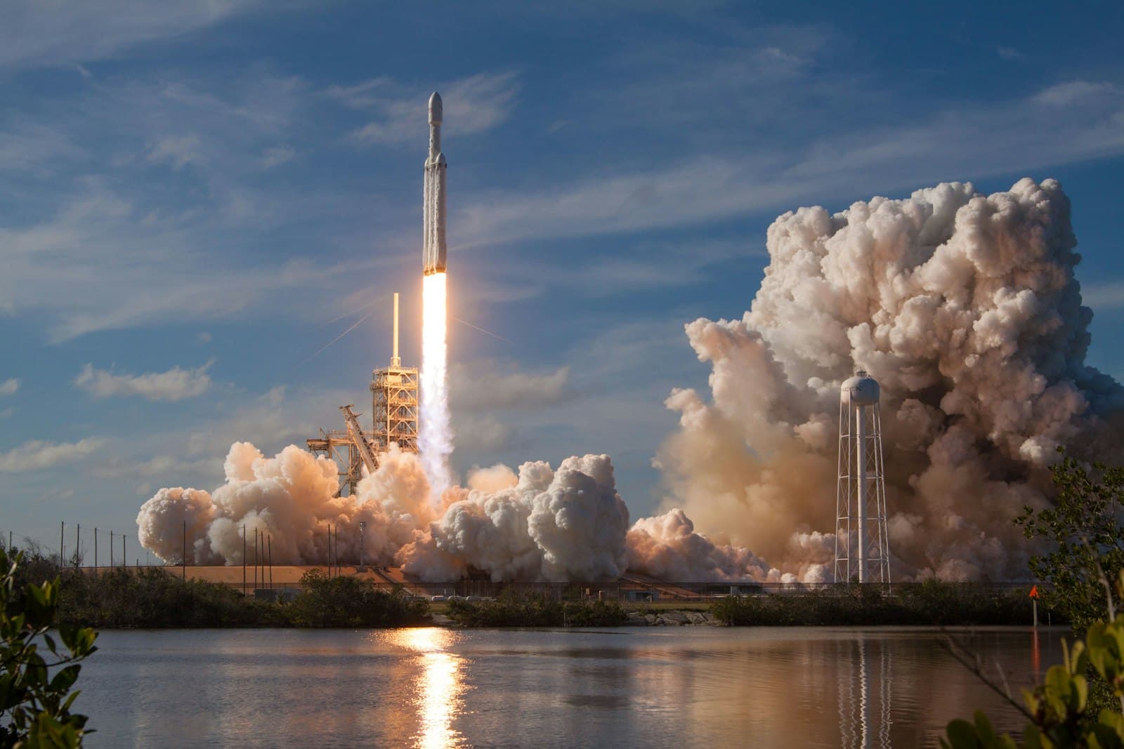 SpaceX rocket lifting off from launch pad