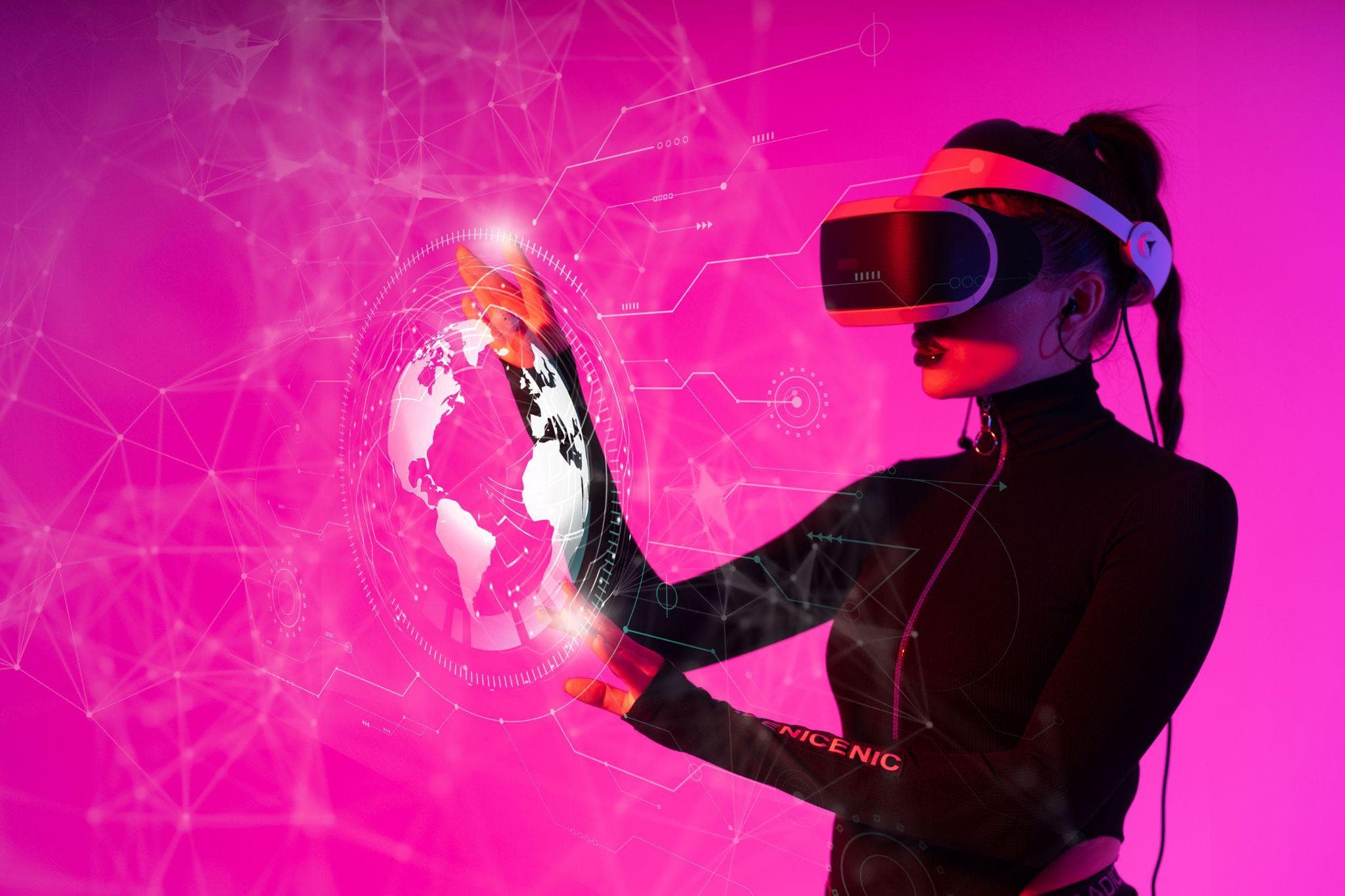 A person wearing a VR headset interacting with a glowing digital globe interface