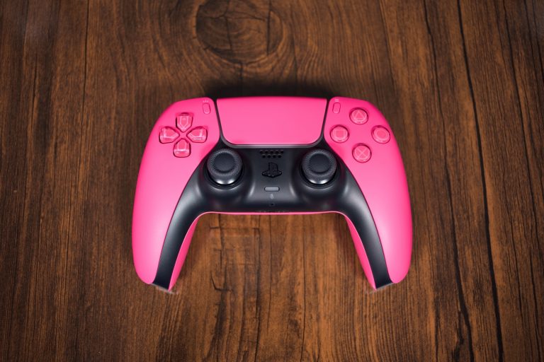 a pink video game controller