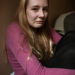 Scared Woman in Pink Long Sleeve Shirt