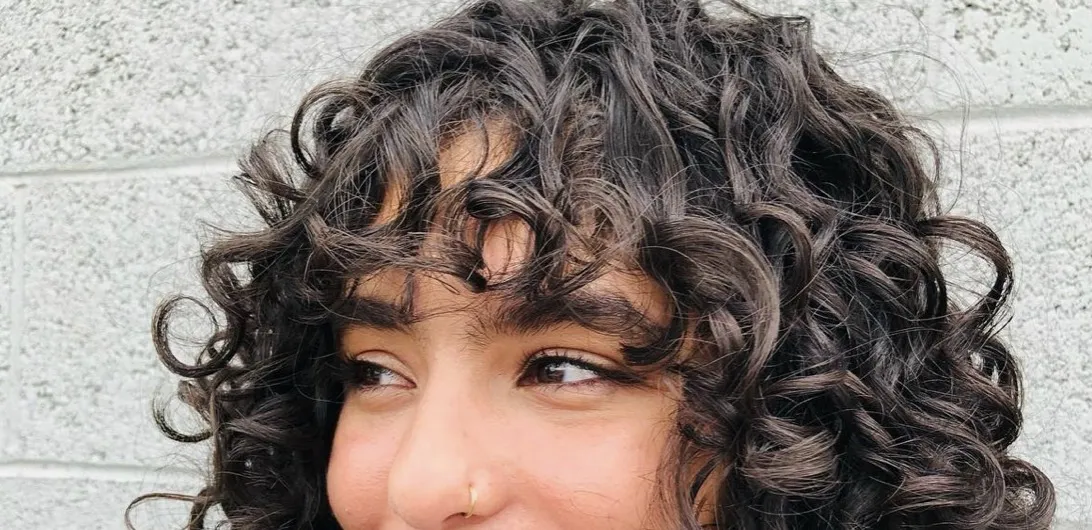 Do curtain bangs work with curly hair?