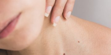 woman wearing black scoop neck top