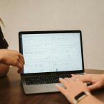 a woman using a laptop