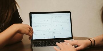 a woman using a laptop