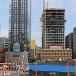 a construction site with a crane in the background