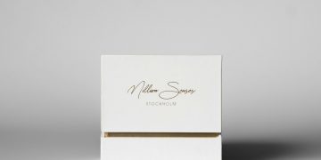 White box with gold trim and text
