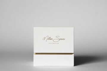 White box with gold trim and text