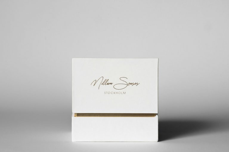 White box with gold trim and text
