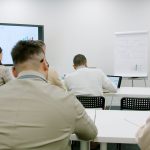 Business people in a modern conference room during a presentation.
