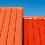 brown wooden wall under blue sky during daytime